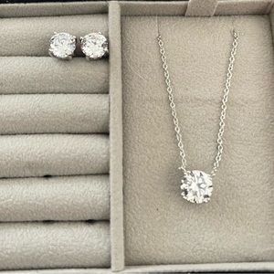 Brand new cubic zirconia necklace and earrings. They have never been worn!